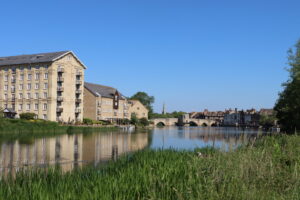 Riverside buildings and historic bridge in St Ives Cambridgeshire
